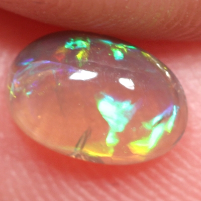 SOLID CRYSTAL OPAL Bright rolling flashes throughout the opal in a 3D pattern